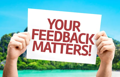 Your Feedback Matters card with a beach on background